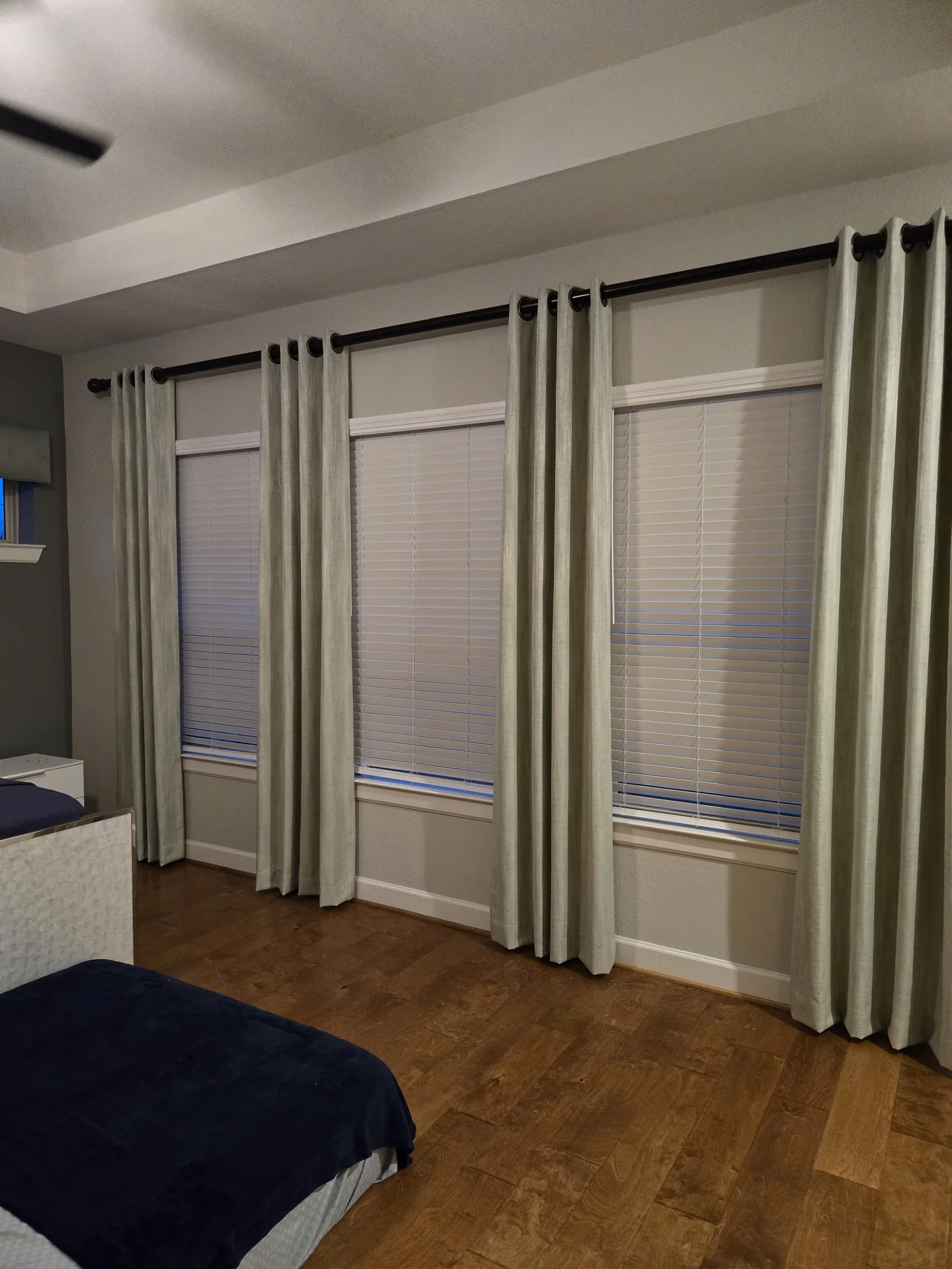 Bedroom with three windows, drapes and blinds — The Blinds Tech